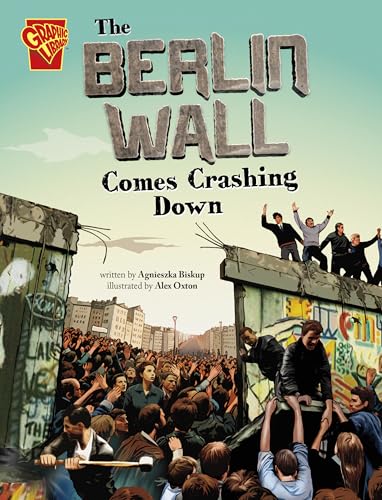 The Berlin Wall comes crashing down